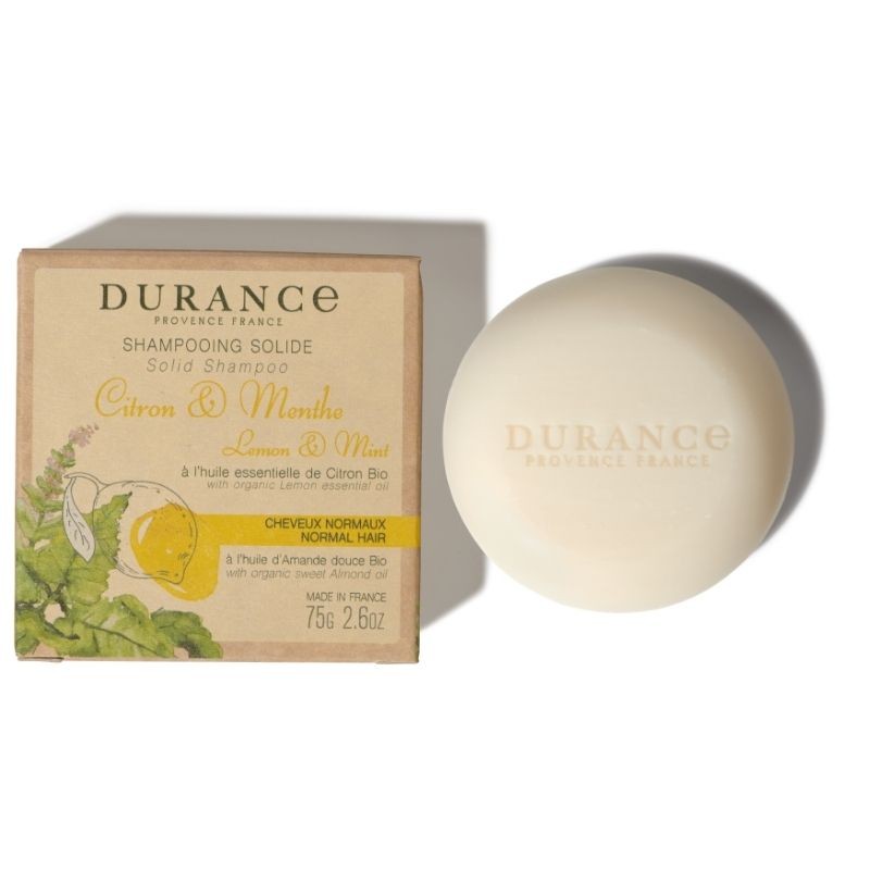 Packaged solid shampoo bar with lemon and mint label, and the Durance brand logo, on a white background.