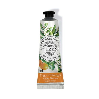 A tube of Durance Soft Hand Cream with Orange Blossom scent, 30 ml in size, with a label featuring orange and green leaves and citrus fruits.