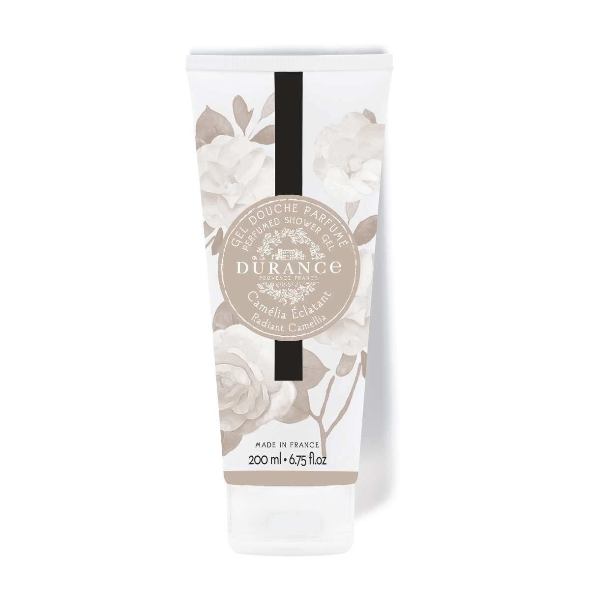 A tube of Durance Radiant Camellia shower gel with a floral design and a black label, 200 ml in size.