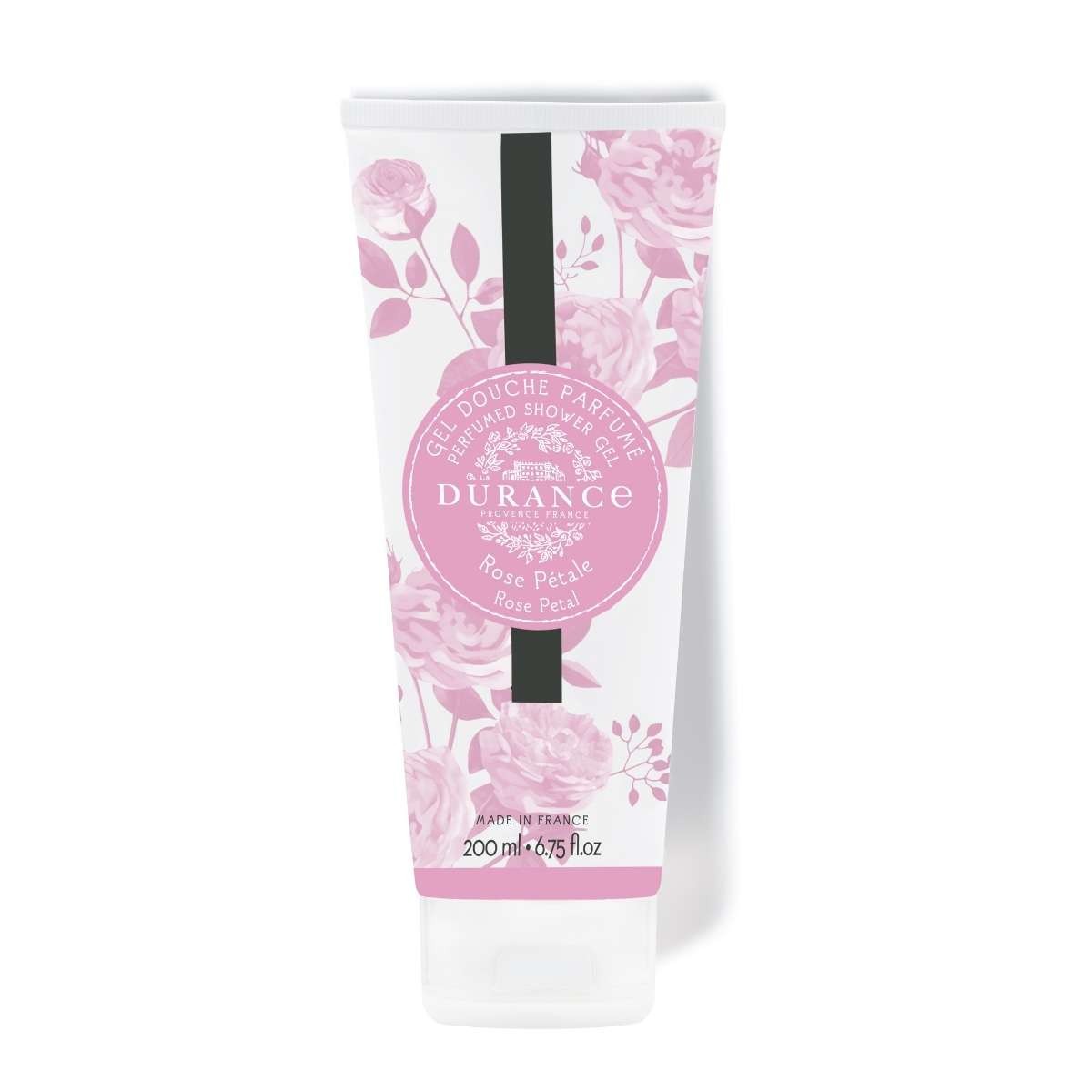 A pink and white Durance shower gel tube with floral patterns, specifically rose designs, and a black band at the top.