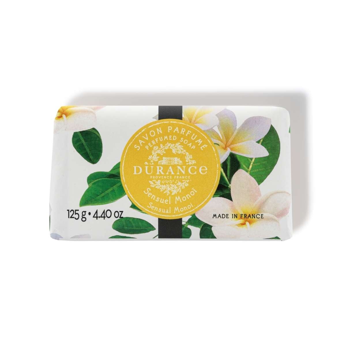 A bar of soap with a floral pattern on the packaging, labeled 'Durance Sensual Monoi, 125g/4.4oz, Made in France'.