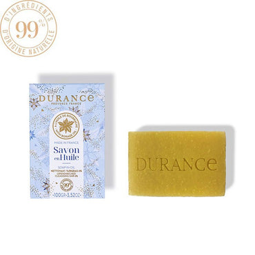 A bar of soap with 'Durance' branding on it, alongside its packaging box with 'Soap-in-Oil with Borage Oil' label and floral design.