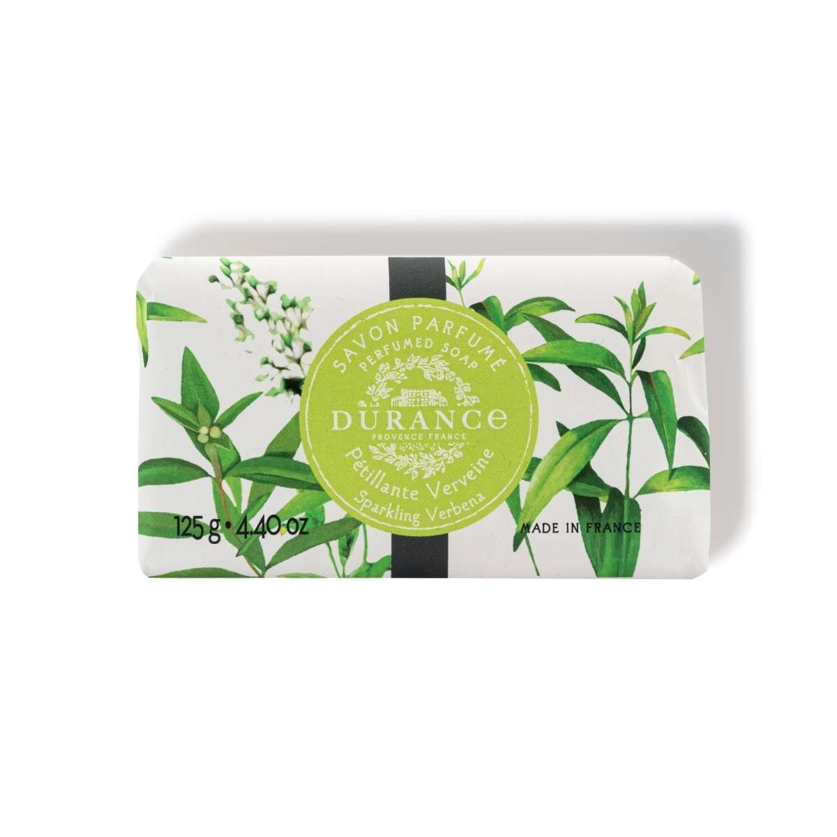 A bar of Durance sparkling verbena soap with green and lemony notes, decorated in white and green packaging.