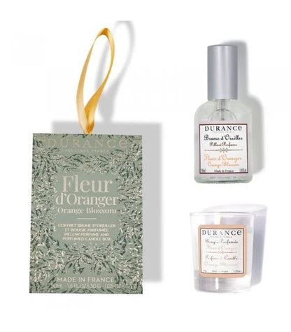 orange blossoms scented candle and a pillow mist