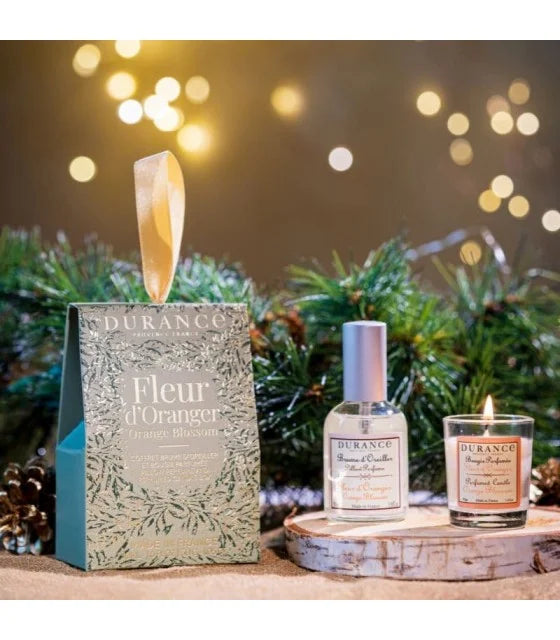 orange blossoms scented candle and a pillow mist