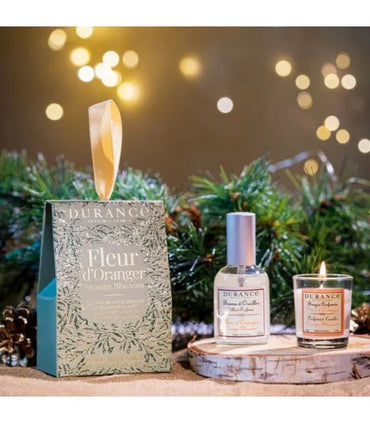 orange blossoms scented candle and a pillow mist