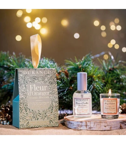 orange blossoms scented candle and a pillow mist
